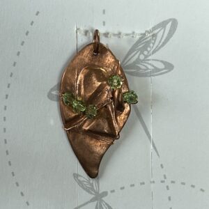 Copper Pendant with Peridot Crystals